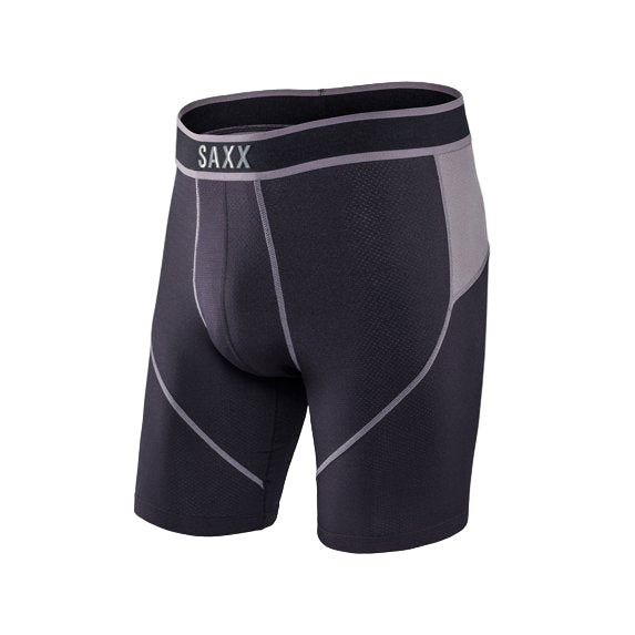 Black and gray compression shorts with SAXX branding on a white background
