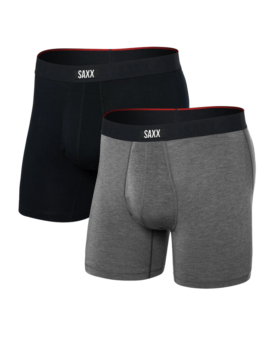 Two pairs of SAXX boxer briefs, one black and one gray, on a white background.