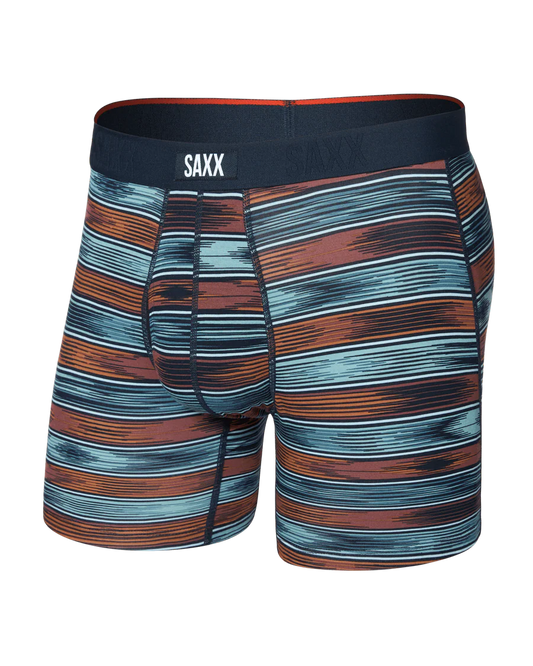 Striped boxer briefs with SAXX branding on a white background