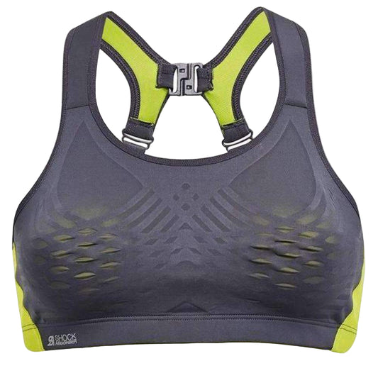 Gray sports bra with green straps on a white background
