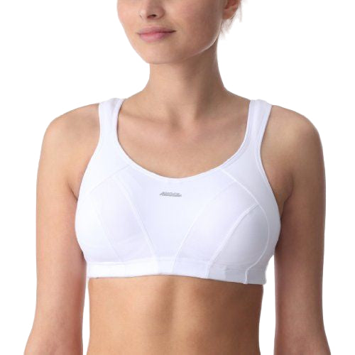 White sports bra worn by a person on a white background