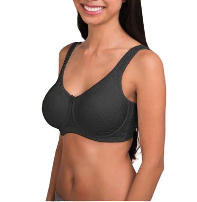 Woman wearing a black bra against a plain background