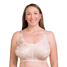 Woman wearing a beige bralette against a white background