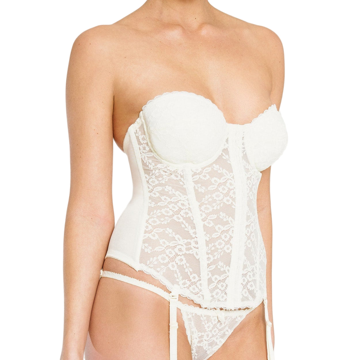 White lace lingerie set on a plain background