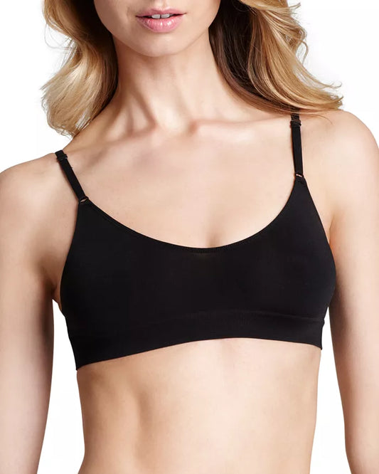 Black bra worn by a model on a white background