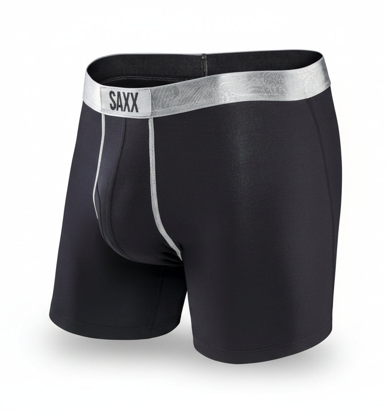 Black SAXX boxer briefs with a silver waistband on a white background