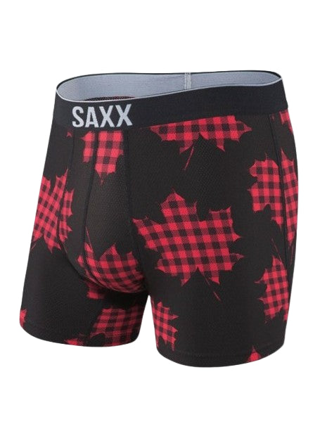 Black boxer briefs with red plaid maple leaf pattern and Saxx branding on a white background
