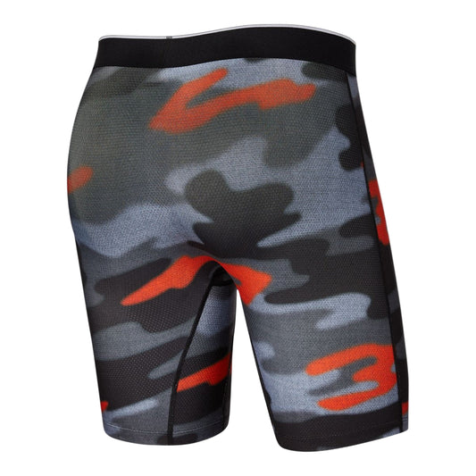 Camouflage shorts with red and black patterns on a white background